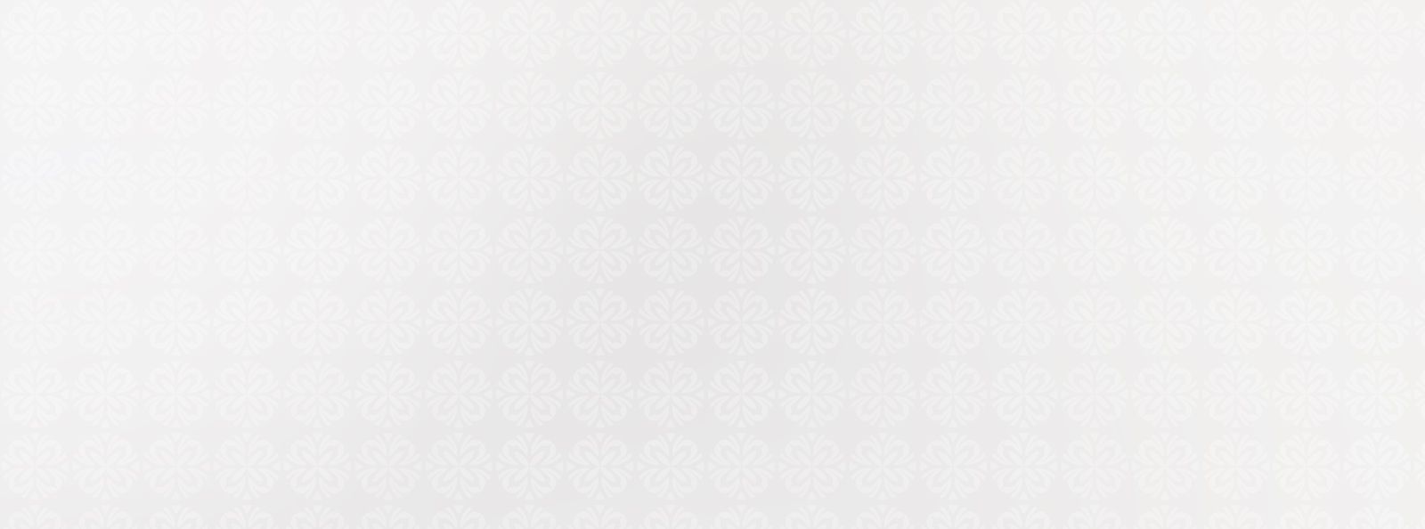 Light floral pattern on a pale background.