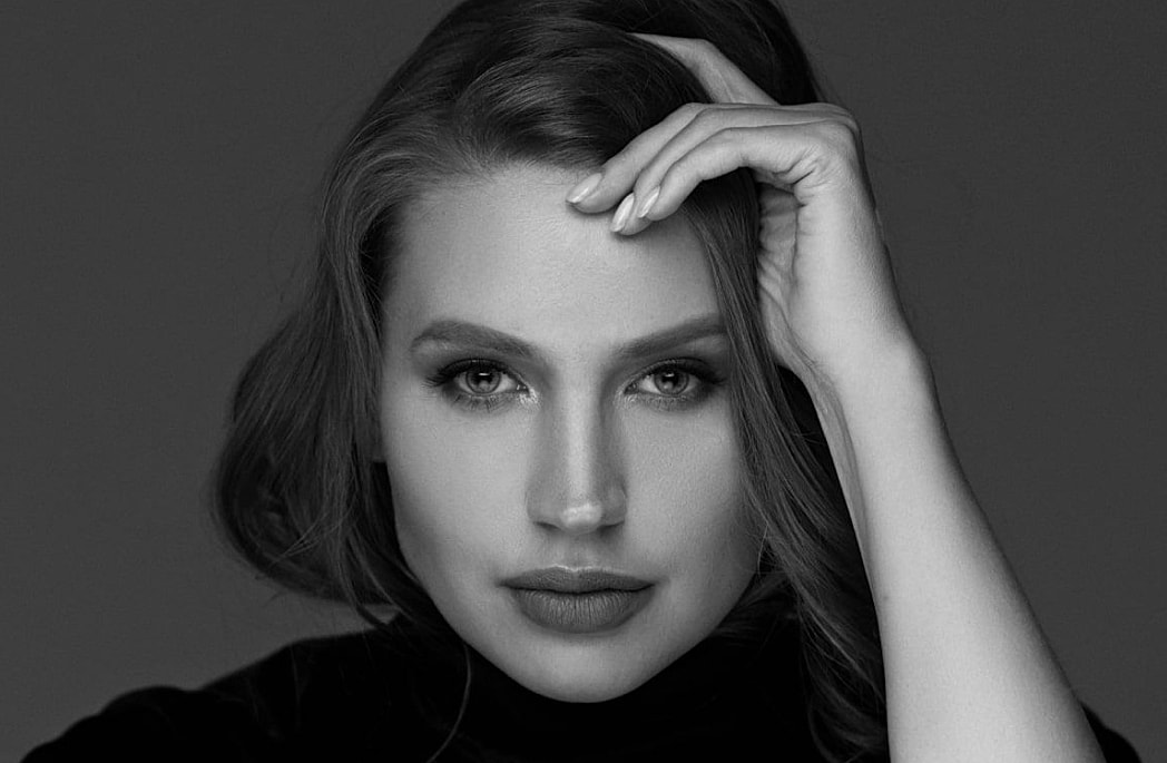 Black and white portrait of a woman.